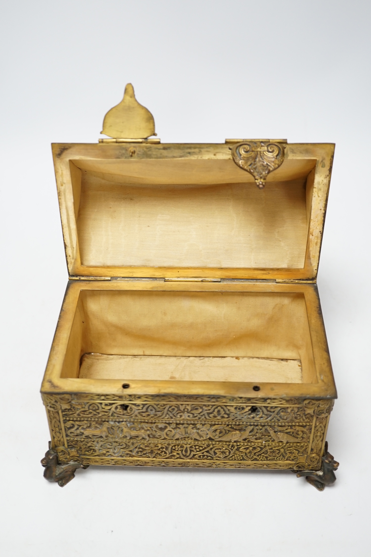 A late 19th century French Gothic revival embossed brass casket, 23cm